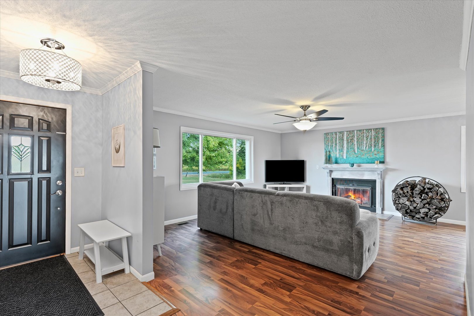 1707 West Old Church Road Champaign, IL 61822 - Photo 6 of 32 a living room with furniture and a flat screen tv