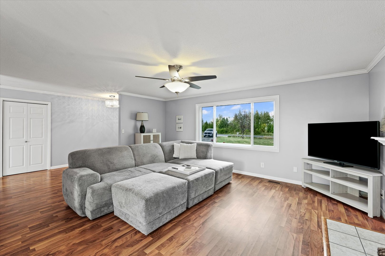 1707 West Old Church Road Champaign, IL 61822 - Photo 9 of 32 a living room with furniture and a flat screen tv