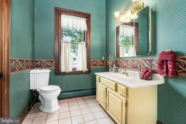 a bathroom with a sink a toilet and a bathtub