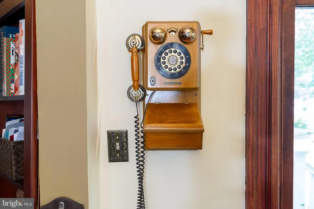 a view of a livingroom with furniture window wooden floor and outdoor space