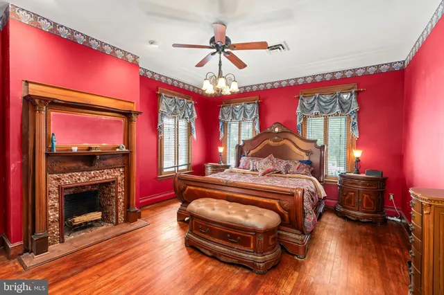 a front view of a house with a yard table and chairs