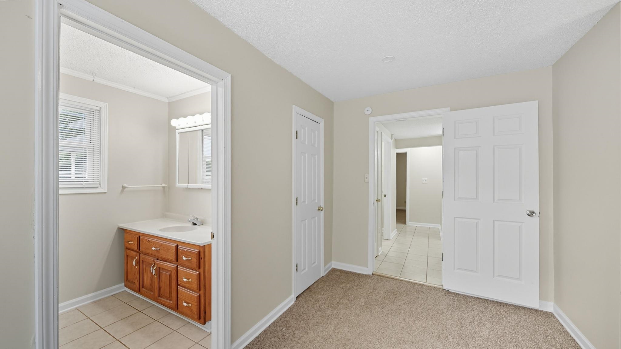 1503 Beaver Road Munford, TN 38058 - Photo 14 of 29 a view of an empty room and bathroom