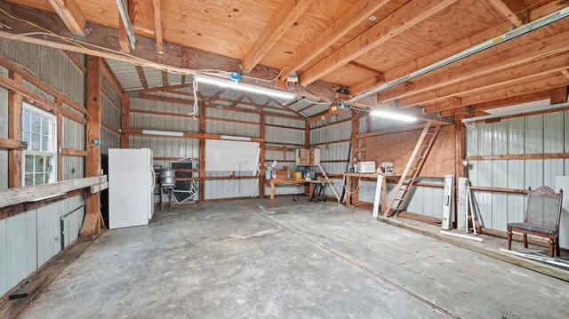 a view of an empty room with storage