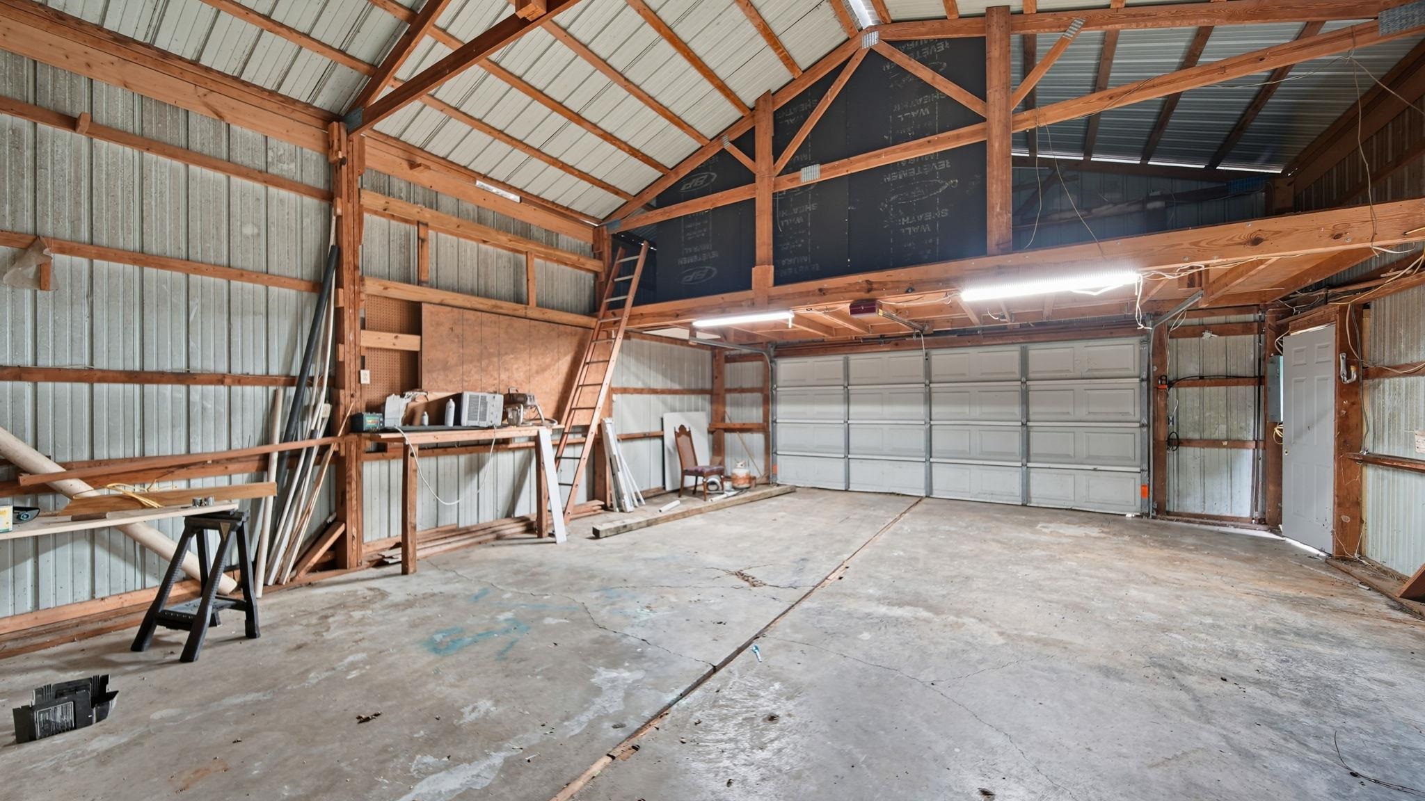 1503 Beaver Road Munford, TN 38058 - Photo 23 of 29 a view of a garage with wooden deck