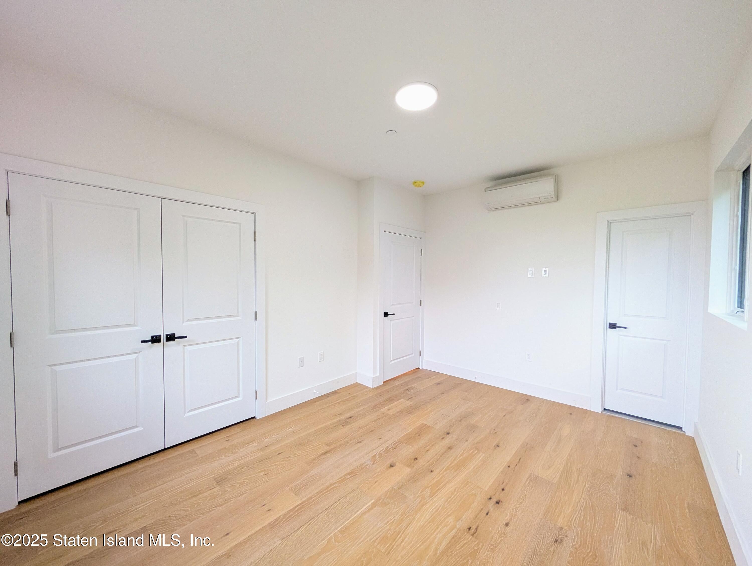3865 Amboy Road, Unit 4B Staten Island, NY 10308 - Photo 8 of 15 a view of a room with an empty space