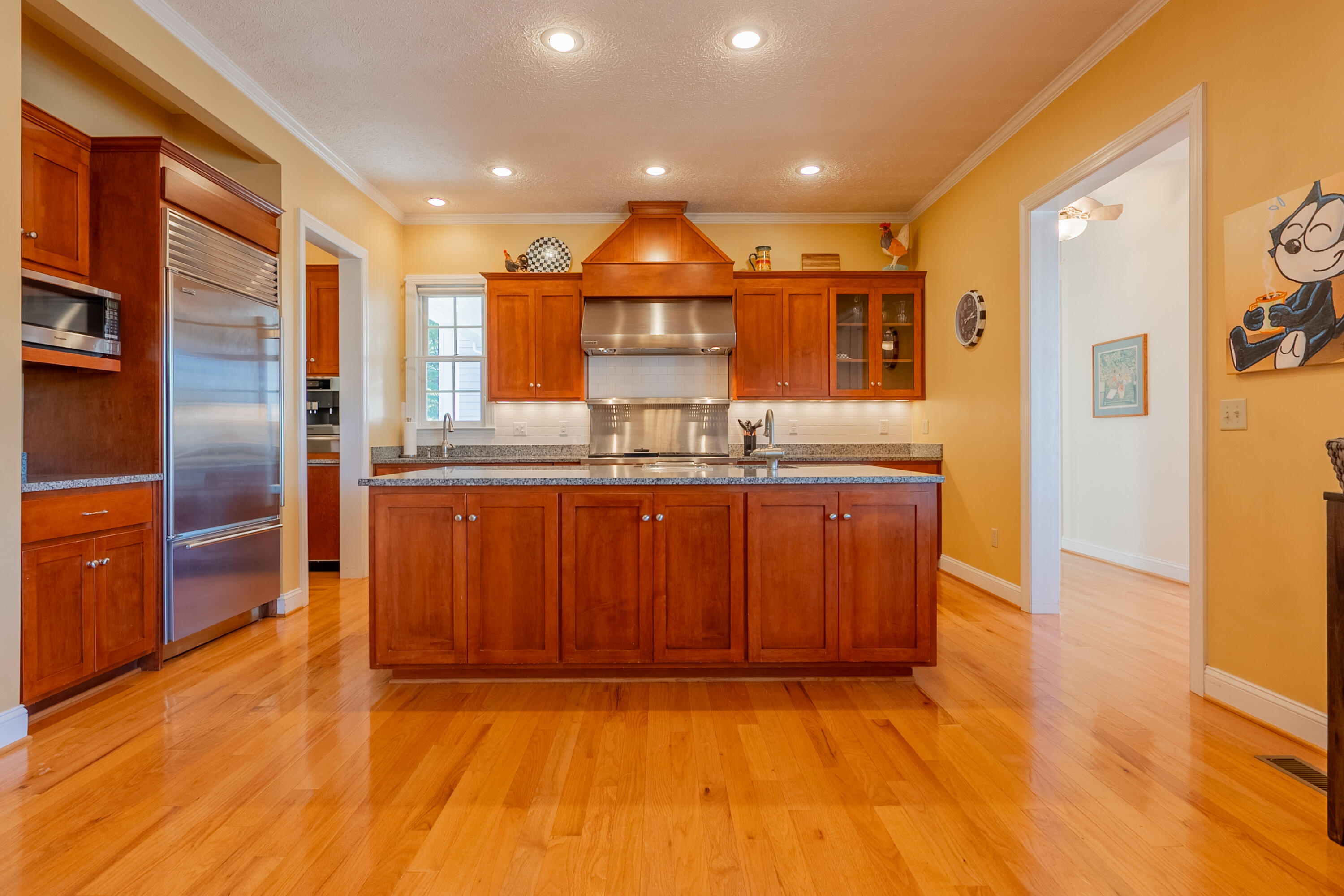 254 Dusty Mile Road Northwest Willis, VA 24380 - Photo 22 of 122 a kitchen with stainless steel appliances granite countertop a refrigerator a sink and a stove