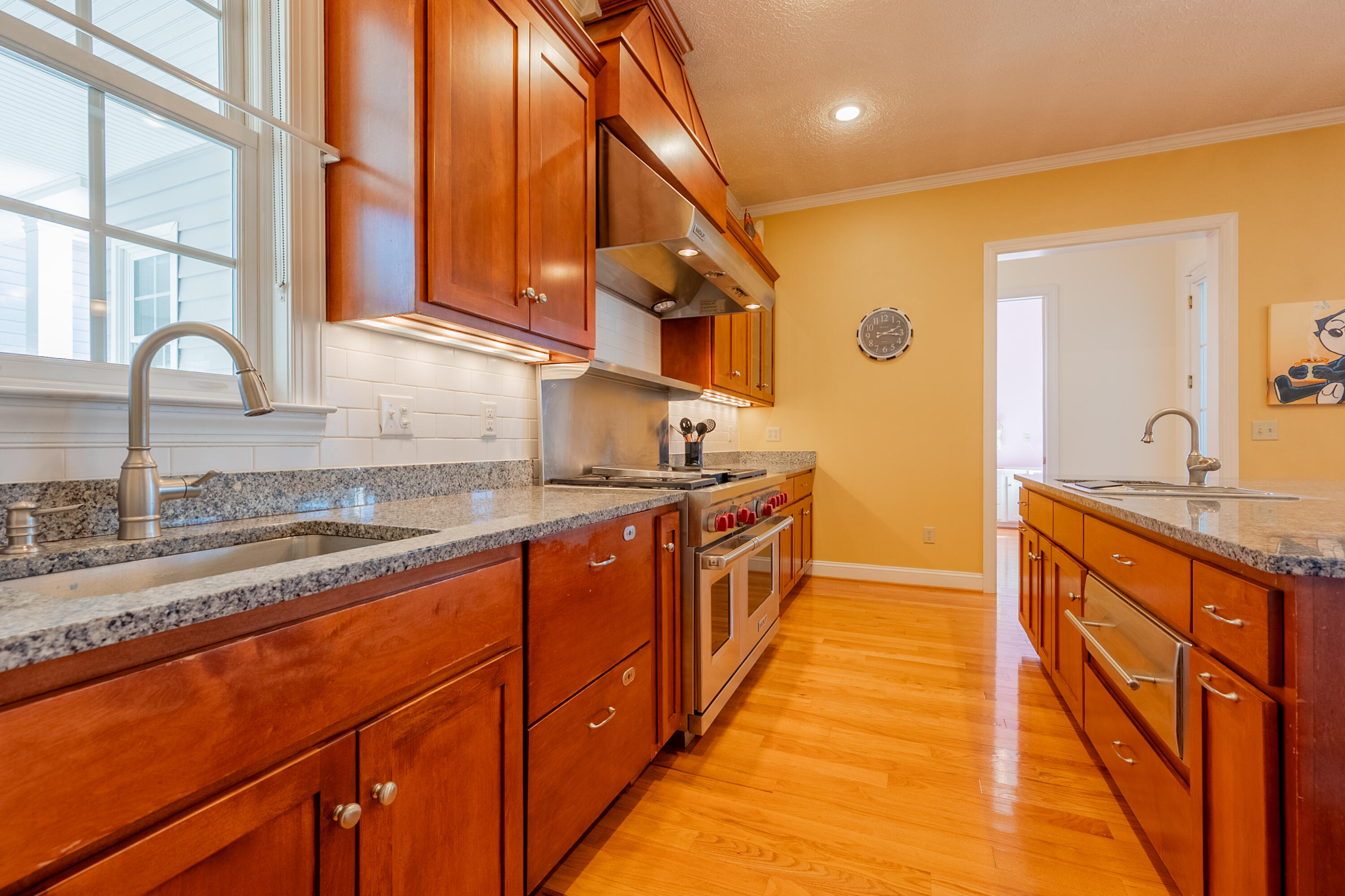 254 Dusty Mile Road Northwest Willis, VA 24380 - Photo 27 of 122 a large kitchen with stainless steel appliances granite countertop a sink and cabinets
