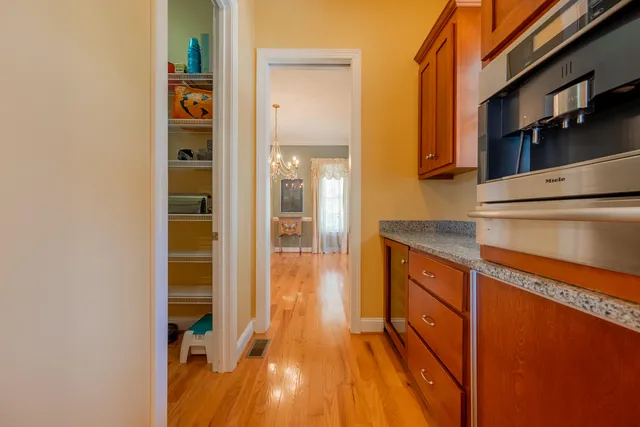 a white toilet sitting next to a shower curtain