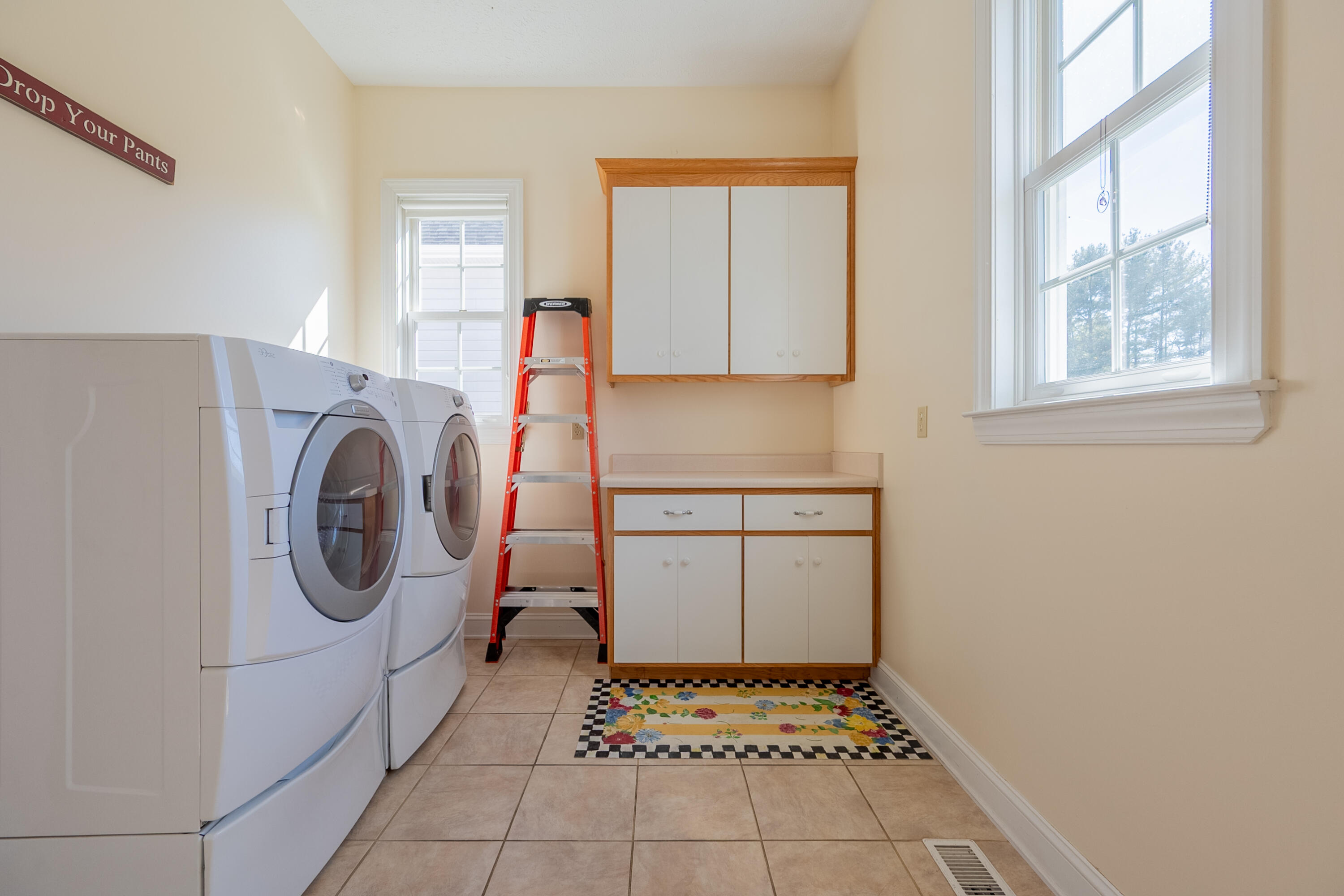 254 Dusty Mile Road Northwest Willis, VA 24380 - Photo 34 of 122 a utility room with dryer and washer