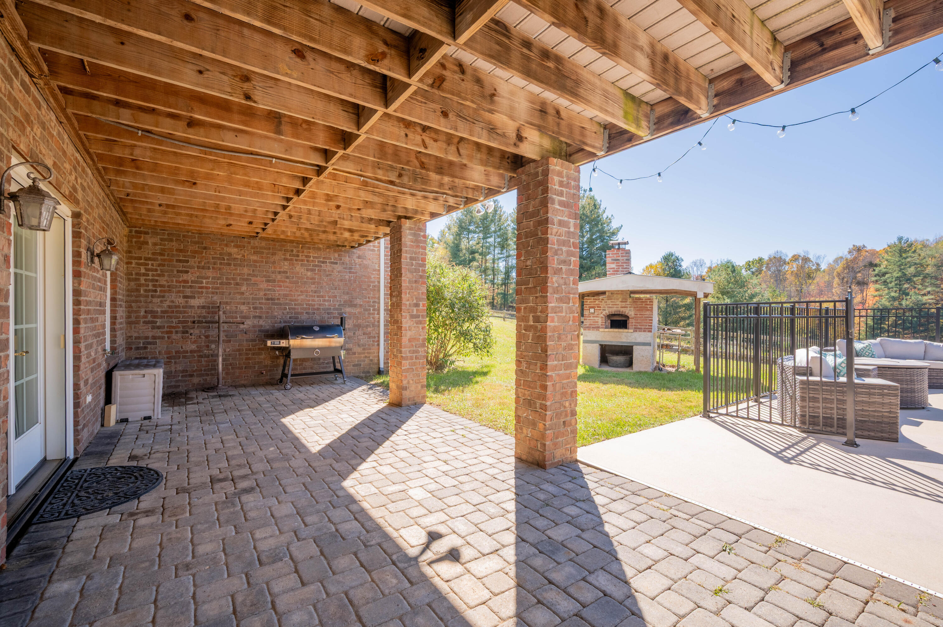 254 Dusty Mile Road Northwest Willis, VA 24380 - Photo 50 of 122 a view of a swimming pool with a patio