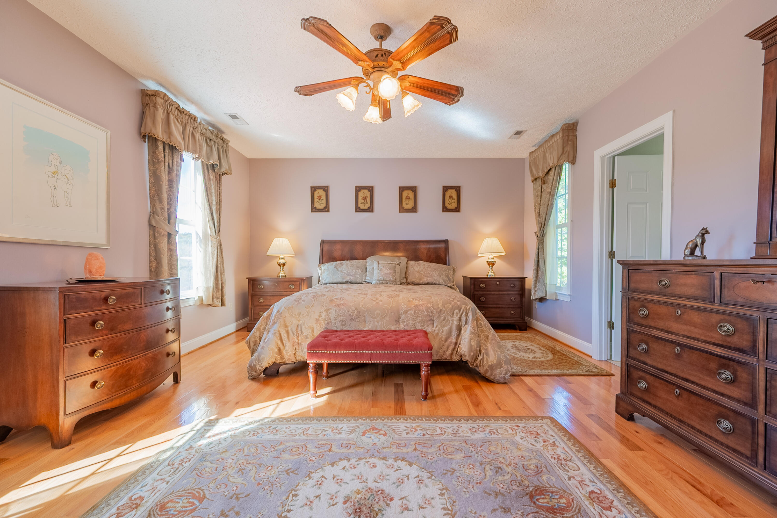 254 Dusty Mile Road Northwest Willis, VA 24380 - Photo 79 of 122 a bedroom with a bed and a dresser