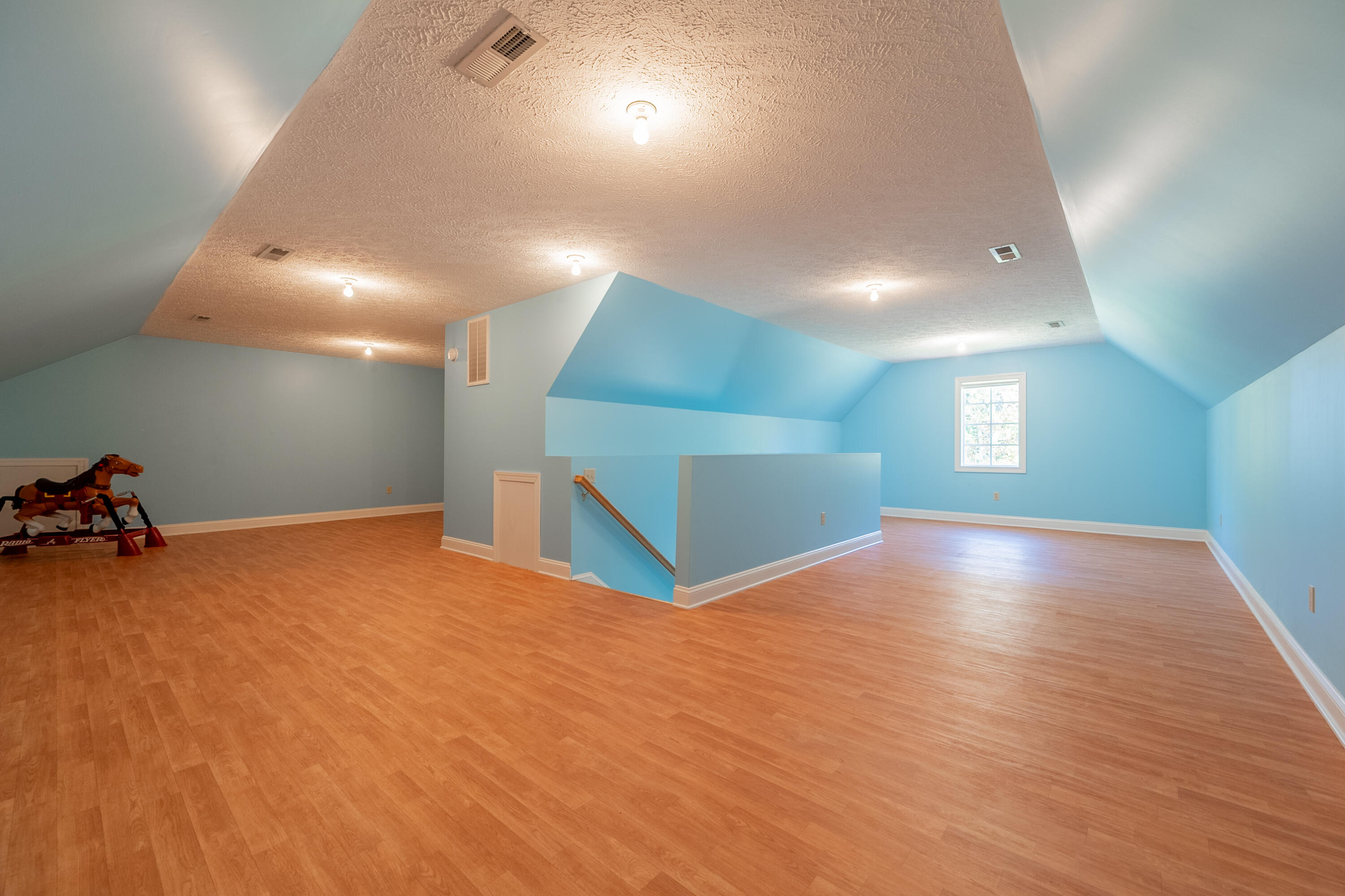 254 Dusty Mile Road Northwest Willis, VA 24380 - Photo 90 of 122 a view of empty room with wooden floor