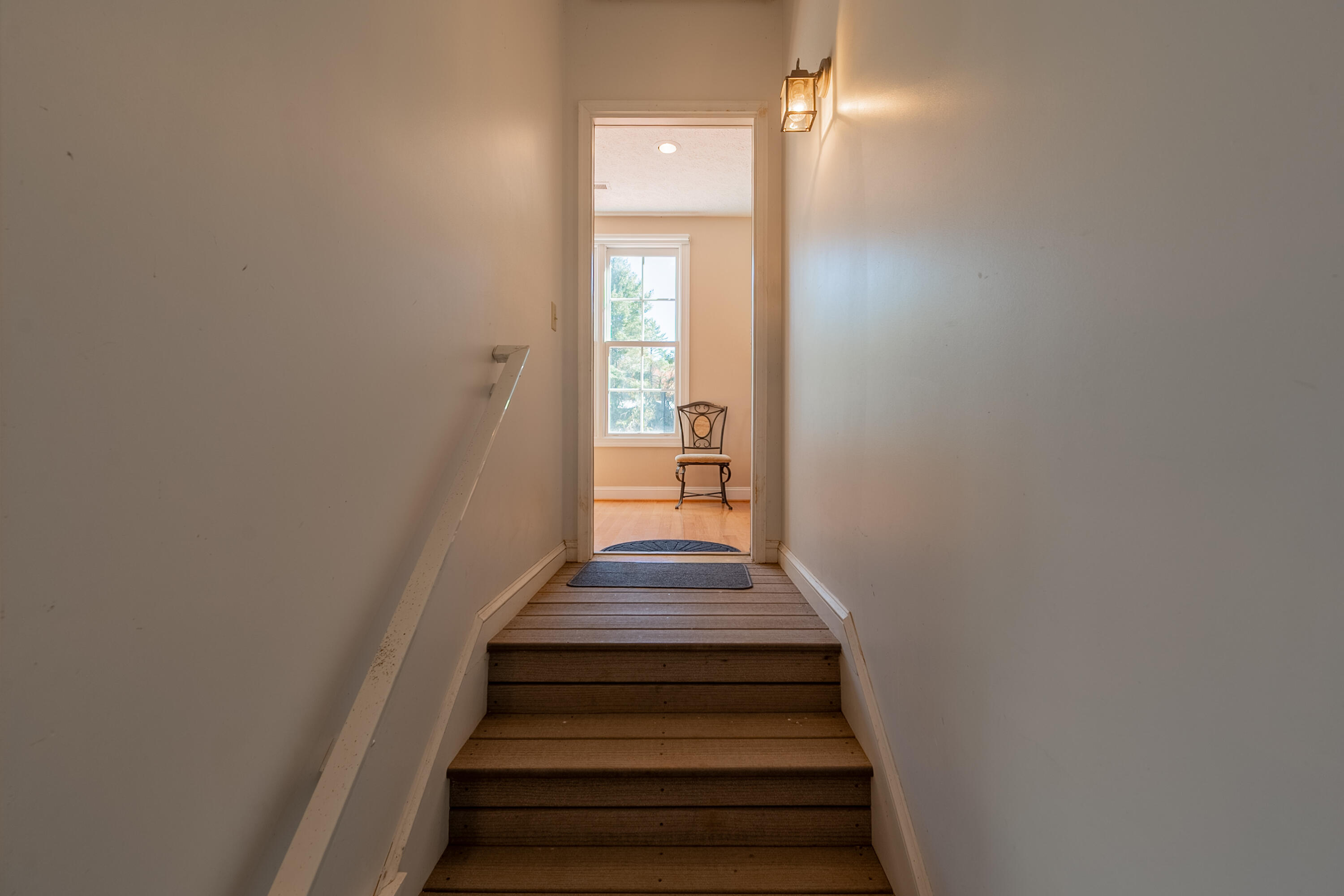254 Dusty Mile Road Northwest Willis, VA 24380 - Photo 96 of 122 a view of a hallway with wooden floor and entryway