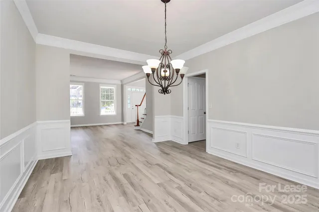a view of a livingroom with wooden floor