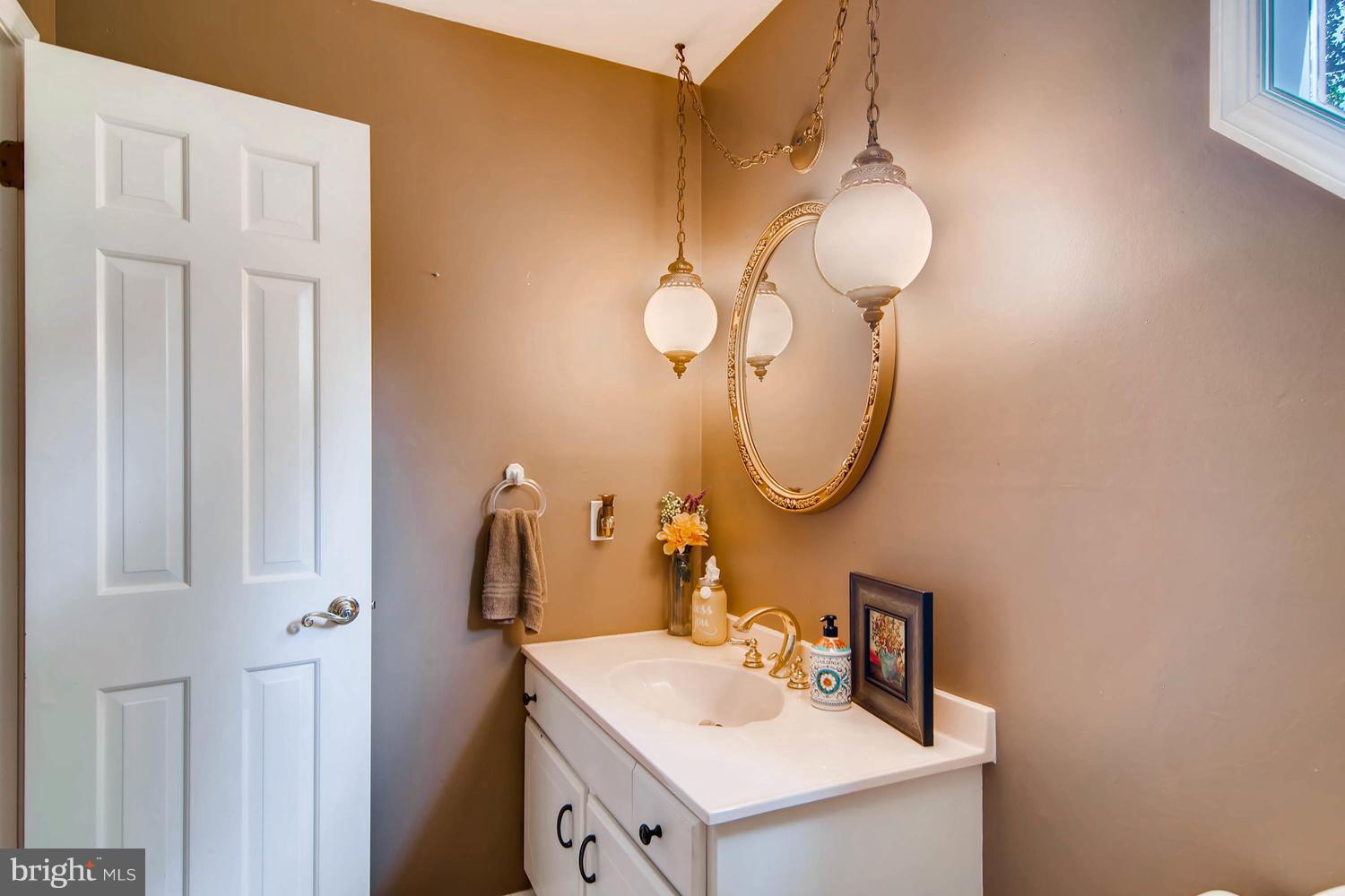 2503 Rochelle Drive Fallston, MD 21047 - Photo 14 of 30 a bathroom with a sink and a mirror