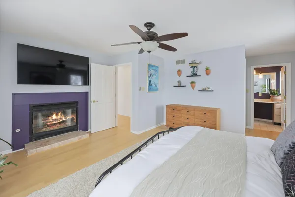 a front view of a house with sitting area