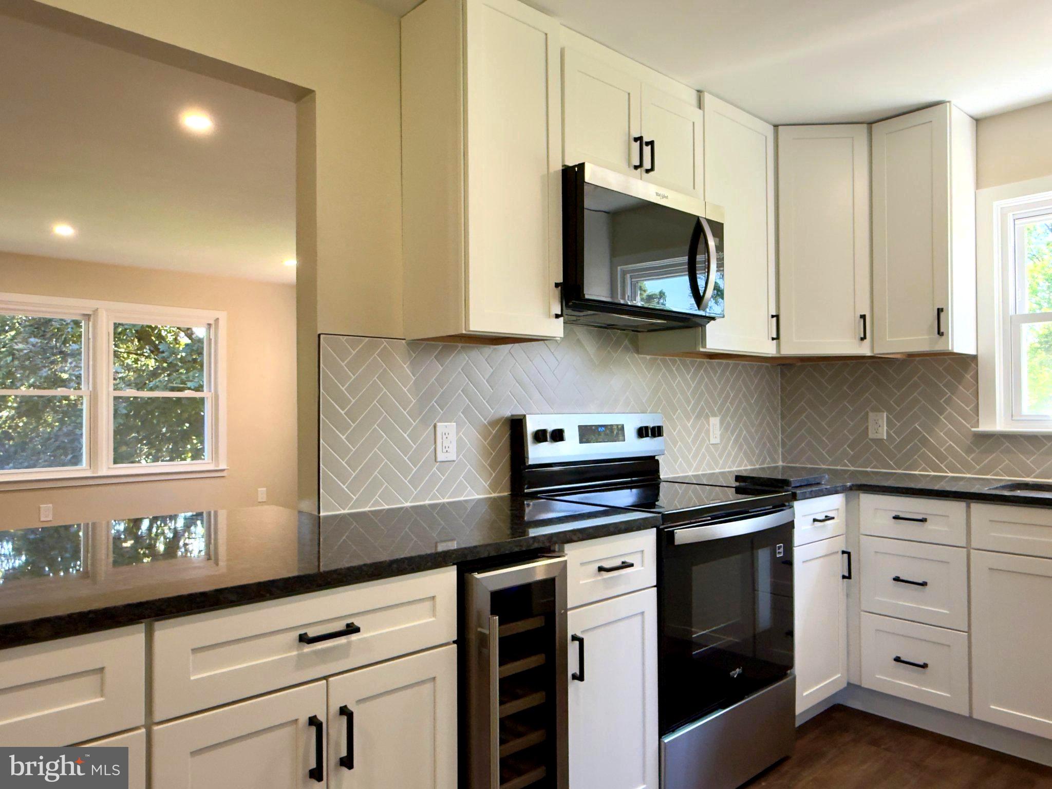 921 Shelbourne Road Reading, PA 19606 - Photo 9 of 34 Modern kitchen with sleek finishes.