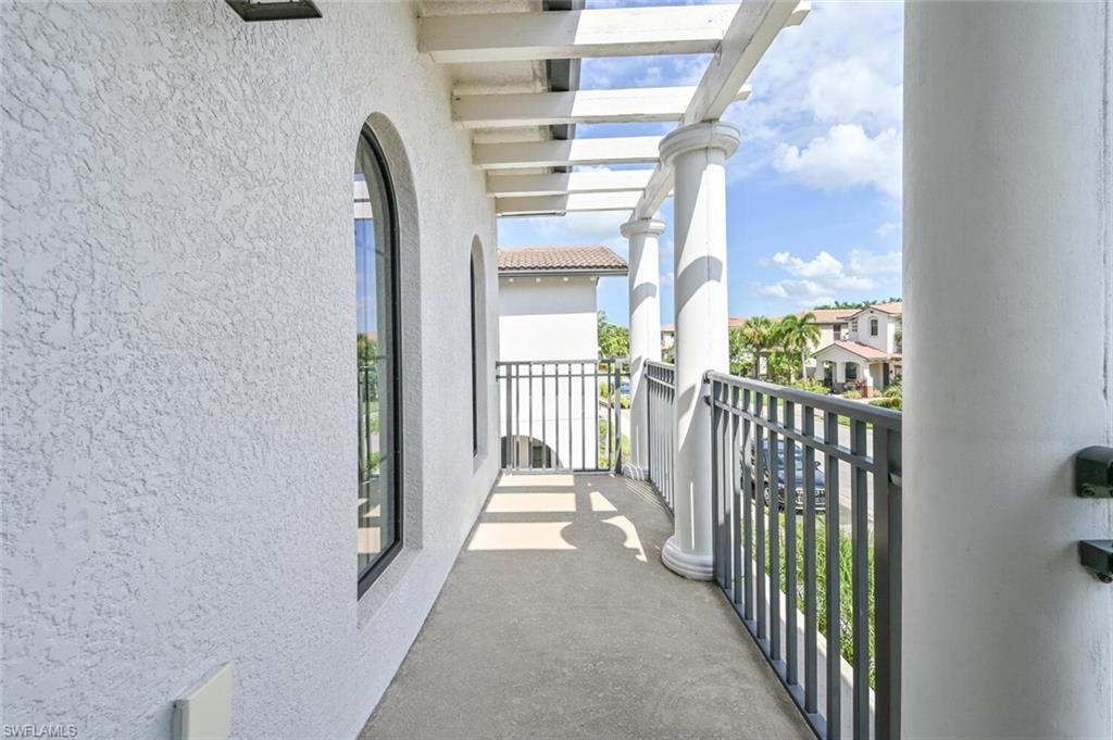 1326 Kendari Terrace Naples, FL 34113 - Photo 12 of 37 a view of a balcony