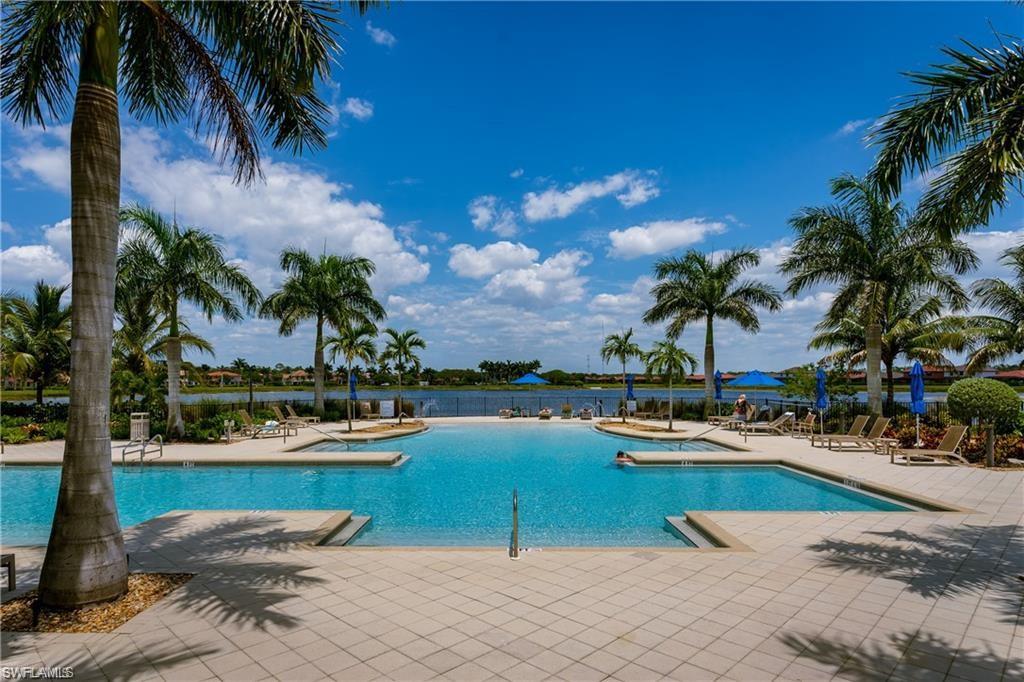 1326 Kendari Terrace Naples, FL 34113 - Photo 25 of 37 a view of outdoor space with swimming pool