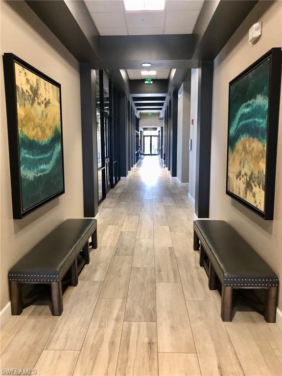 1326 Kendari Terrace Naples, FL 34113 - Photo 26 of 37 a lobby with furniture and window