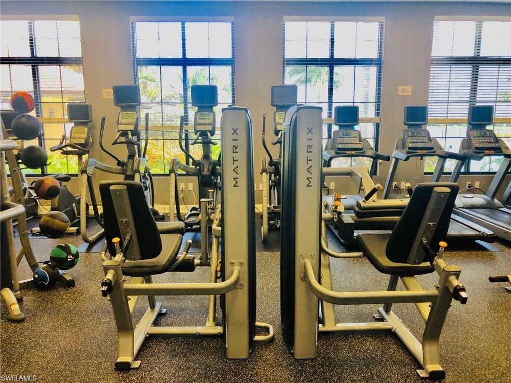 1326 Kendari Terrace Naples, FL 34113 - Photo 28 of 37 a view of a room with gym equipment