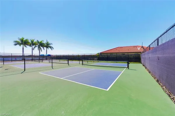 a lobby with furniture and window