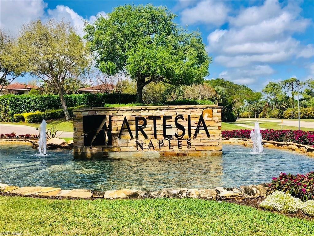 1326 Kendari Terrace Naples, FL 34113 - Photo 33 of 37 a view of outdoor space with swimming pool and trees