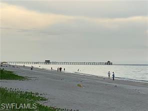 1326 Kendari Terrace Naples, FL 34113 - Photo 36 of 37 a view of a ocean beach