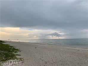 1326 Kendari Terrace Naples, FL 34113 - Photo 37 of 37 a view of an ocean beach