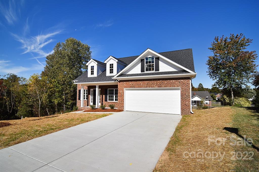 0 Pepperidge Lane Monroe, NC 28110 - Photo 2 of 28 a front view of a house with a yard and garage