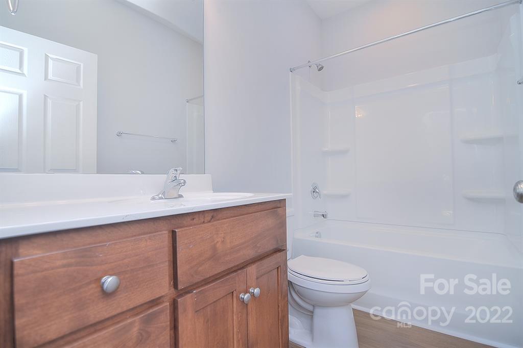 0 Pepperidge Lane Monroe, NC 28110 - Photo 21 of 28 a bathroom with a sink a toilet and shower