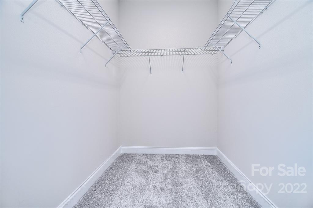 0 Pepperidge Lane Monroe, NC 28110 - Photo 26 of 28 a view of a room with racks on the wall