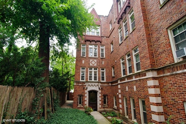 72 Pine Avenue, Unit 2B Riverside, IL 60546 - Photo 1 of 10 a view of a building with a large windows