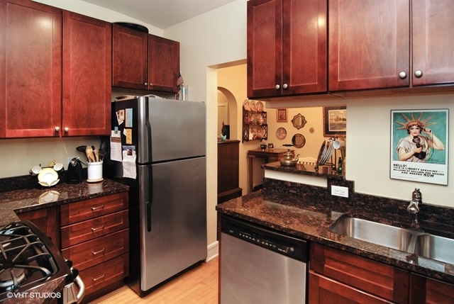 72 Pine Avenue, Unit 2B Riverside, IL 60546 - Photo 3 of 10 a kitchen with granite countertop stainless steel appliances a refrigerator and a sink