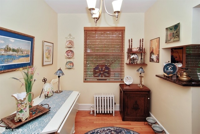 72 Pine Avenue, Unit 2B Riverside, IL 60546 - Photo 5 of 10 a living room with furniture and a window