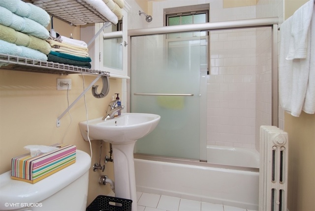72 Pine Avenue, Unit 2B Riverside, IL 60546 - Photo 8 of 10 a bathroom with a sink and a mirror