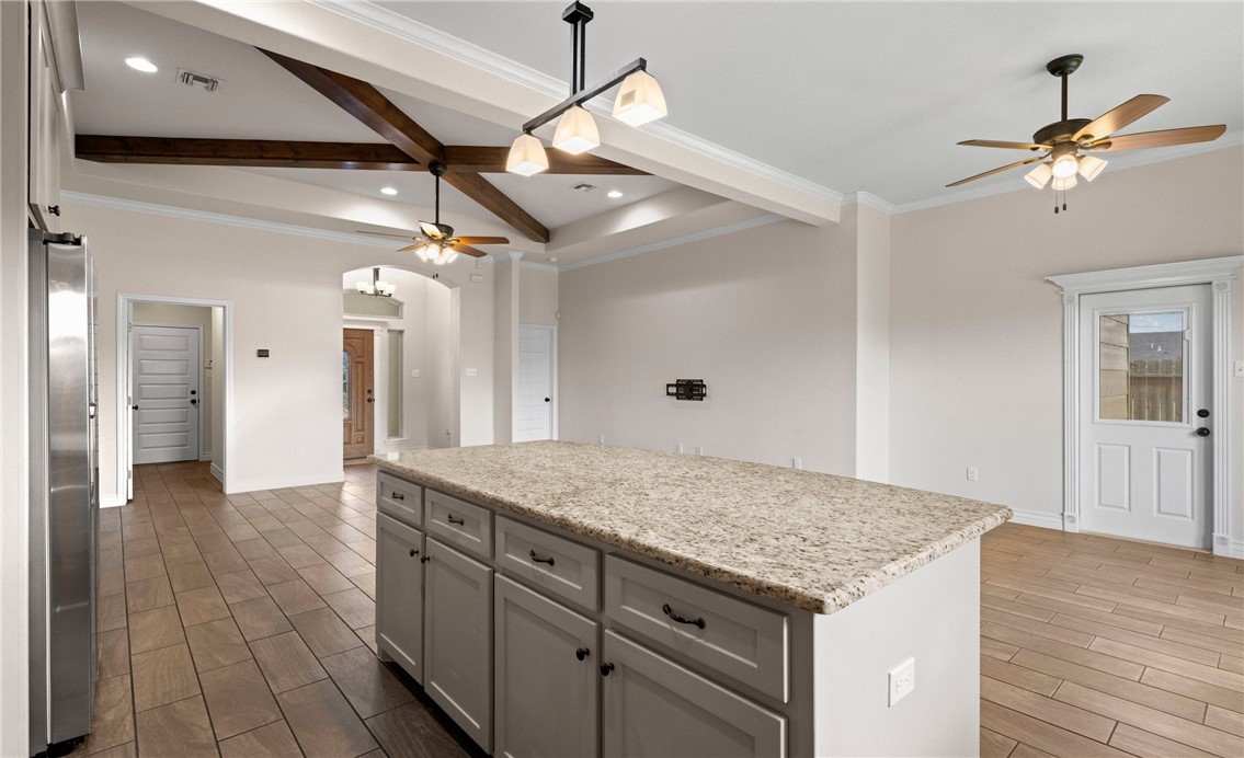 2517 Luzius Drive Corpus Christi, TX 78418 - Photo 11 of 25 a kitchen with a table and chairs