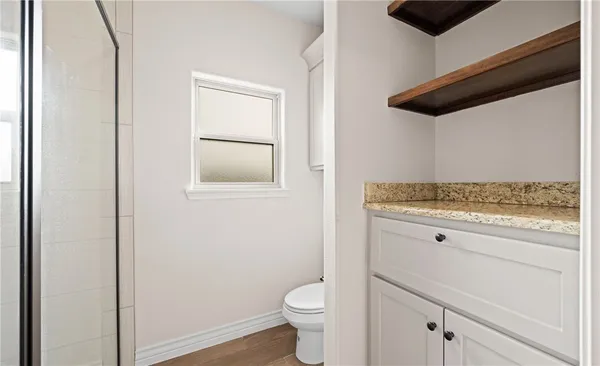 a view of an empty walk in closet