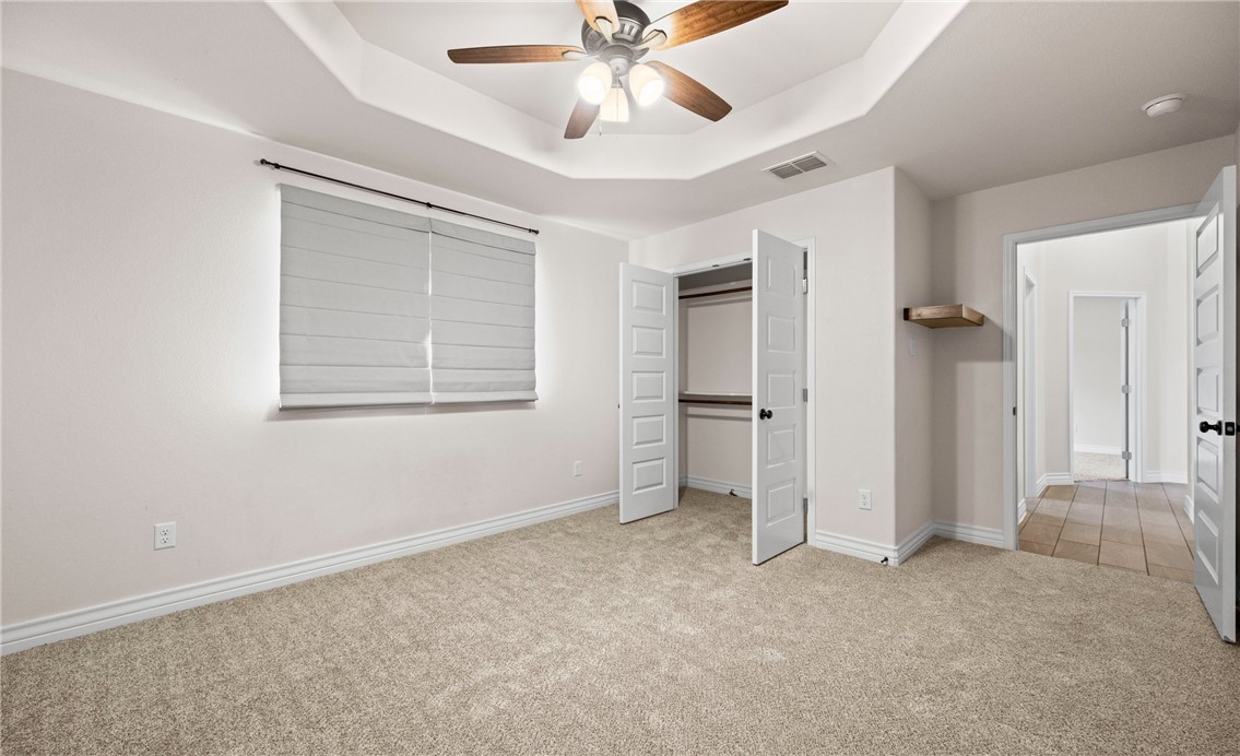 2517 Luzius Drive Corpus Christi, TX 78418 - Photo 22 of 25 an empty room with closet and windows