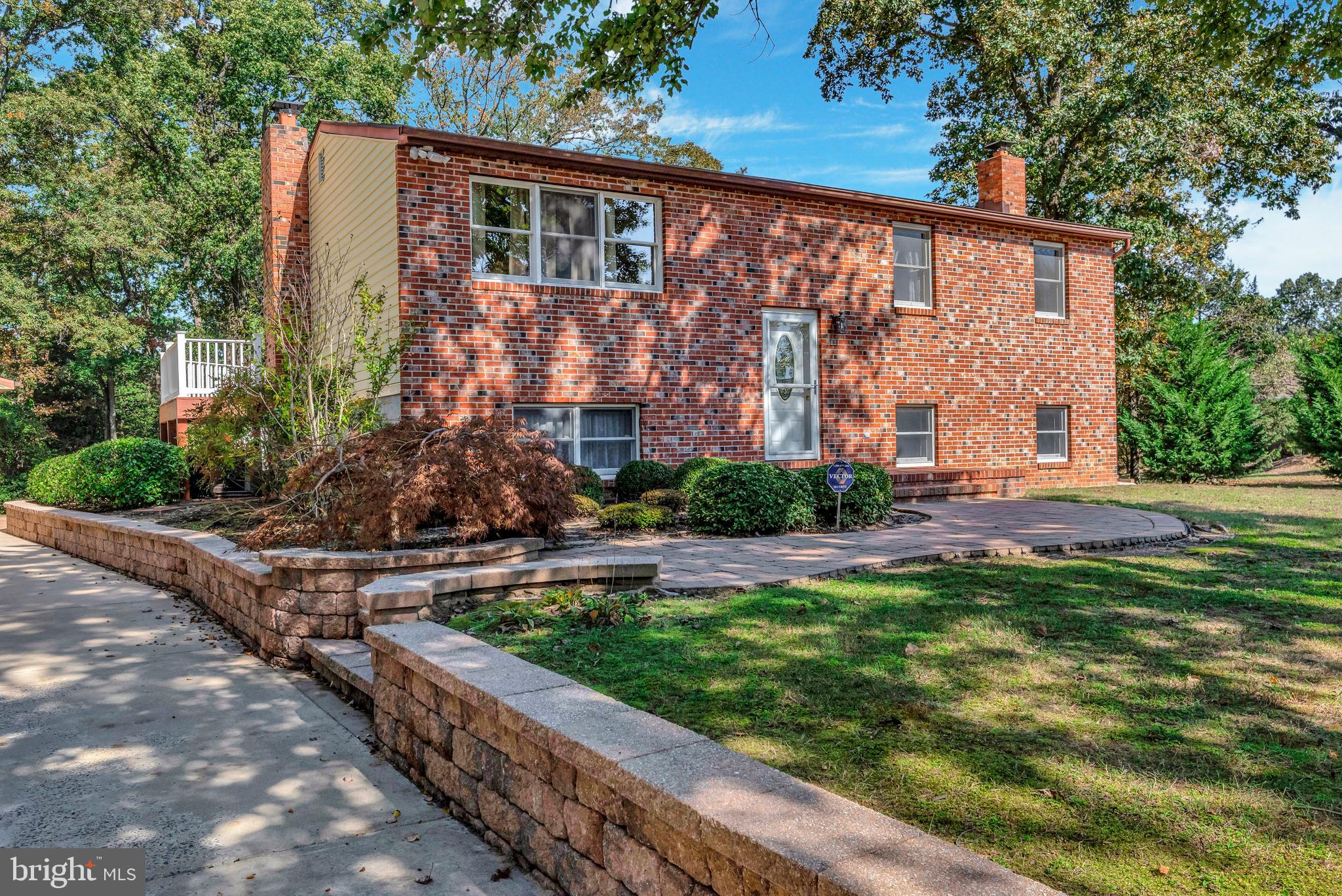 Brick lined driveway easily park 10 cars