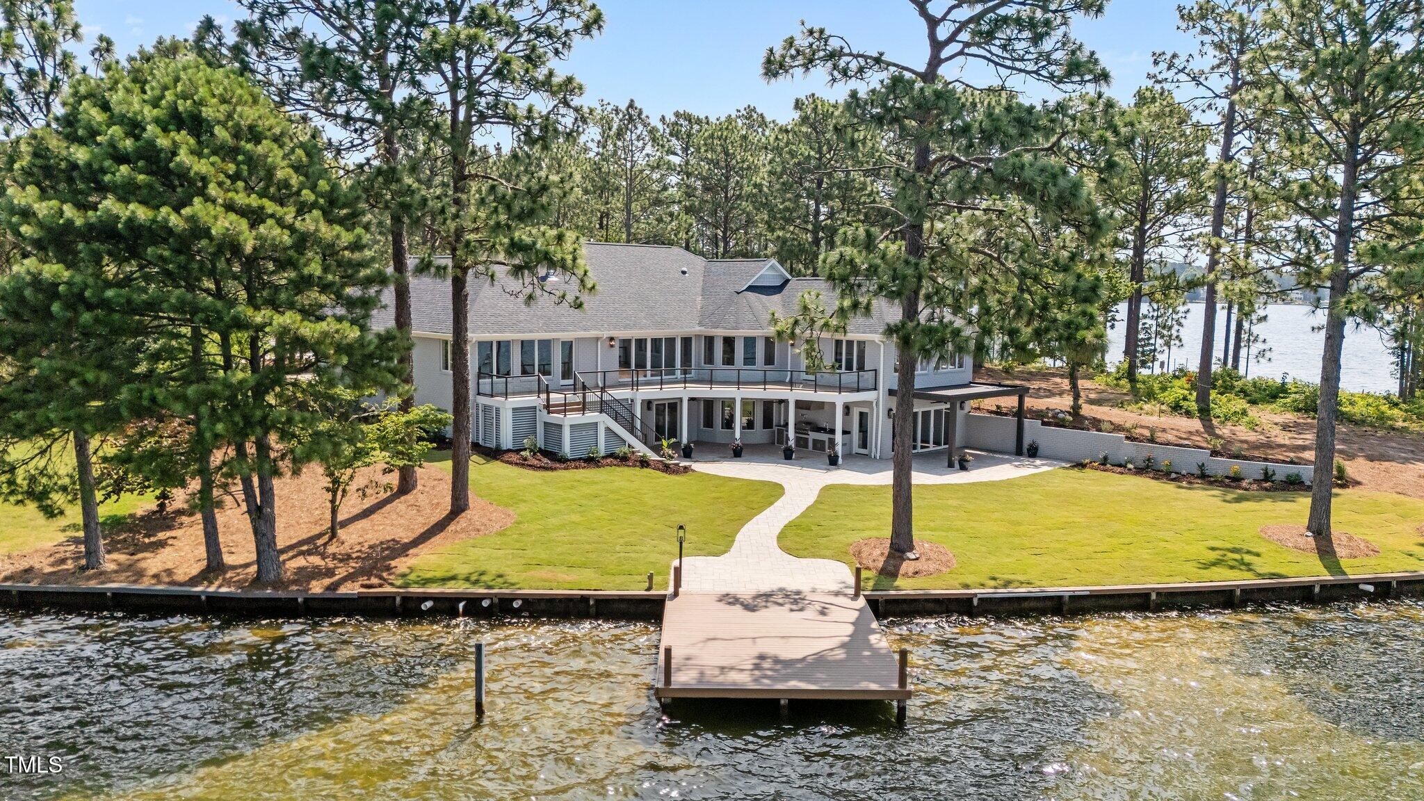 106 Mace Point West End, NC 27376 - Photo 1 of 79 6-web-or-mls-DJI_20250626111504_0710_D