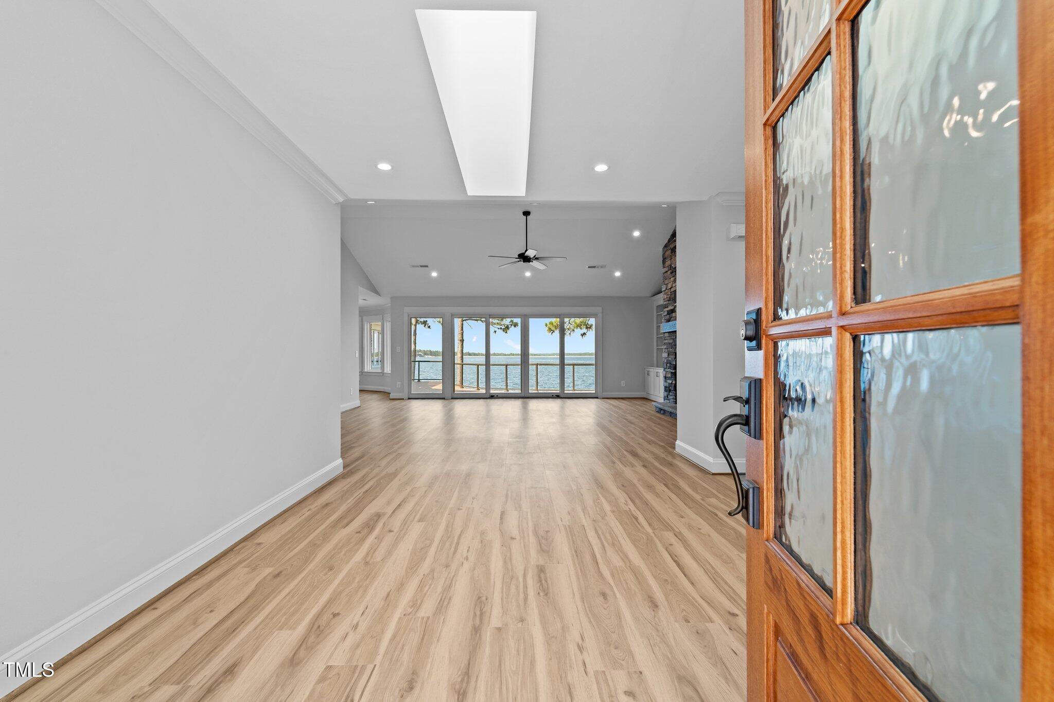 106 Mace Point West End, NC 27376 - Photo 9 of 79 a view of a room with wooden floor and a window