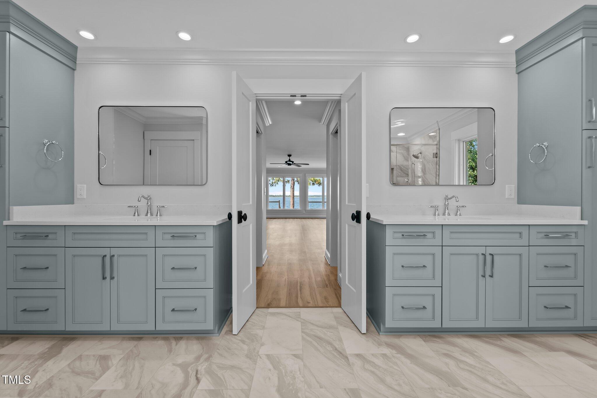 106 Mace Point West End, NC 27376 - Photo 14 of 79 a spacious bathroom with a granite countertop sink and mirror
