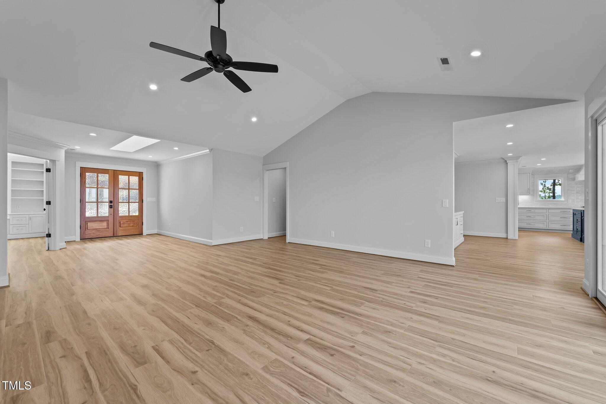 106 Mace Point West End, NC 27376 - Photo 15 of 79 a view of empty room with wooden floor and ceiling fan