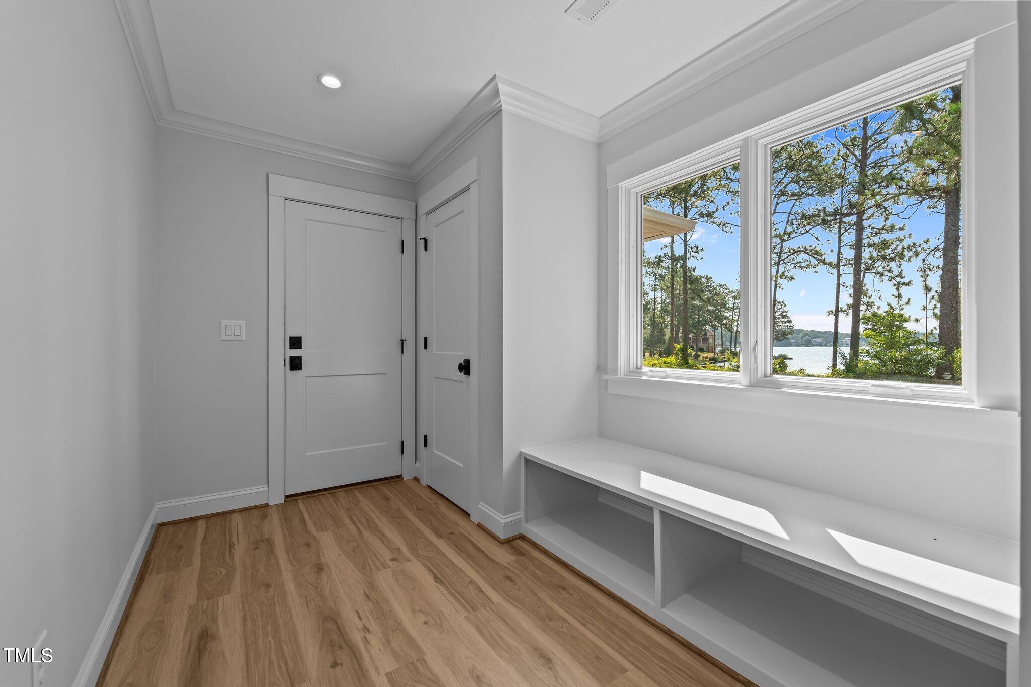106 Mace Point West End, NC 27376 - Photo 29 of 79 a view of room with window and wooden floor