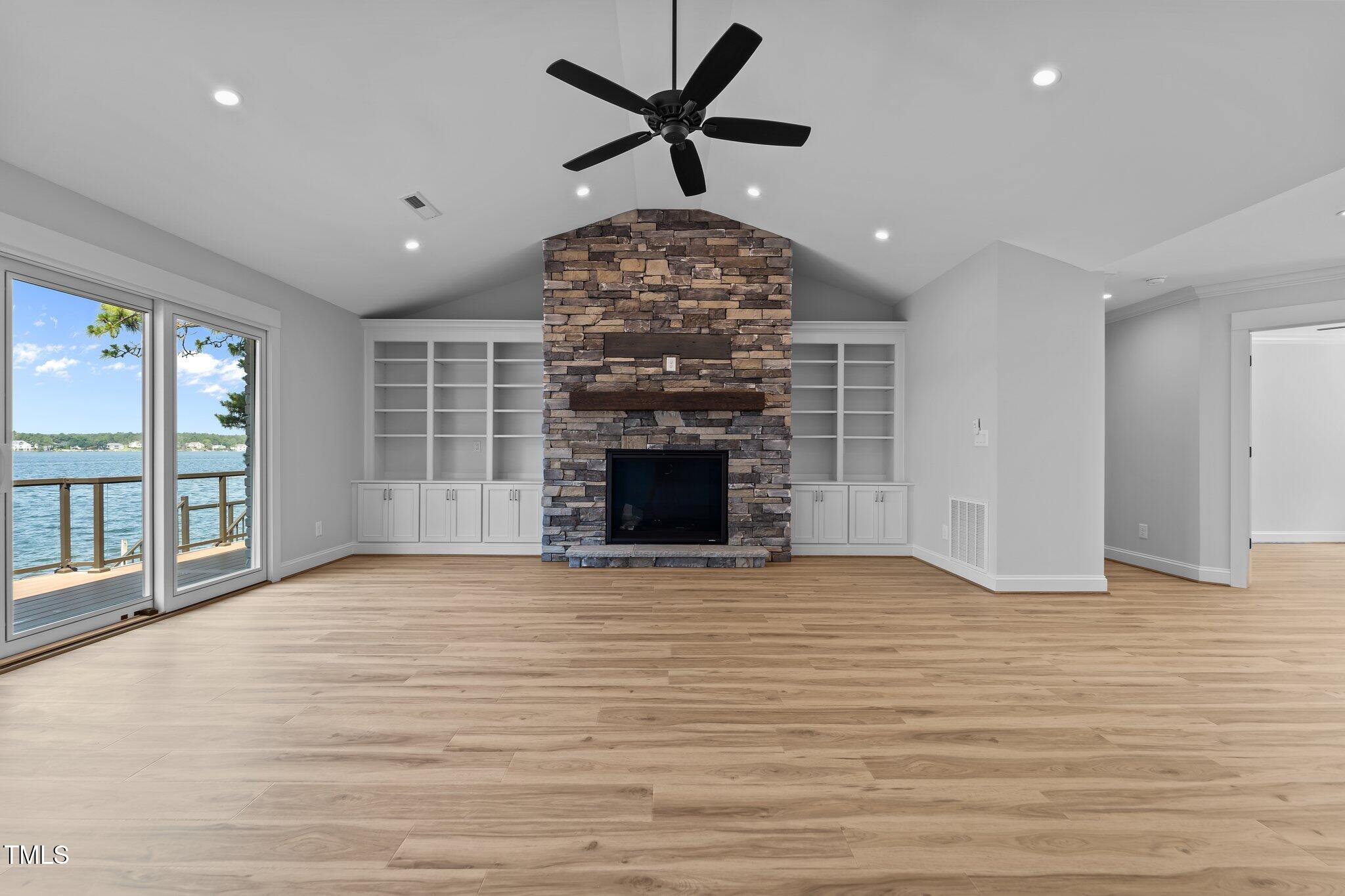 106 Mace Point West End, NC 27376 - Photo 34 of 79 a view of an empty room with a fireplace and a window