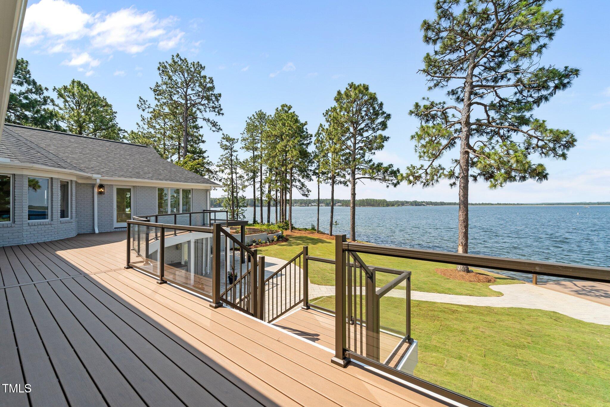 106 Mace Point West End, NC 27376 - Photo 59 of 79 swimming pool view from a balcony with seating space