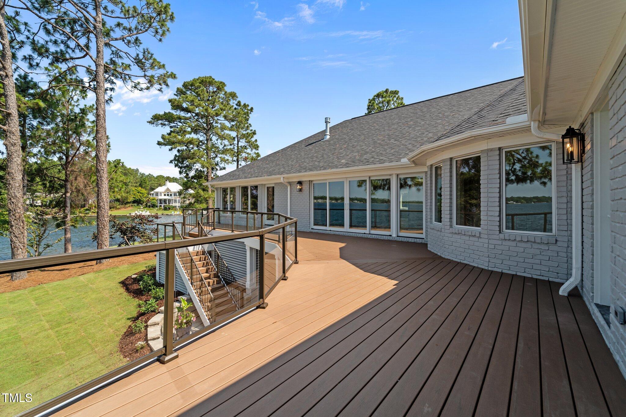 106 Mace Point West End, NC 27376 - Photo 63 of 79 a view of a house with pool on roof deck