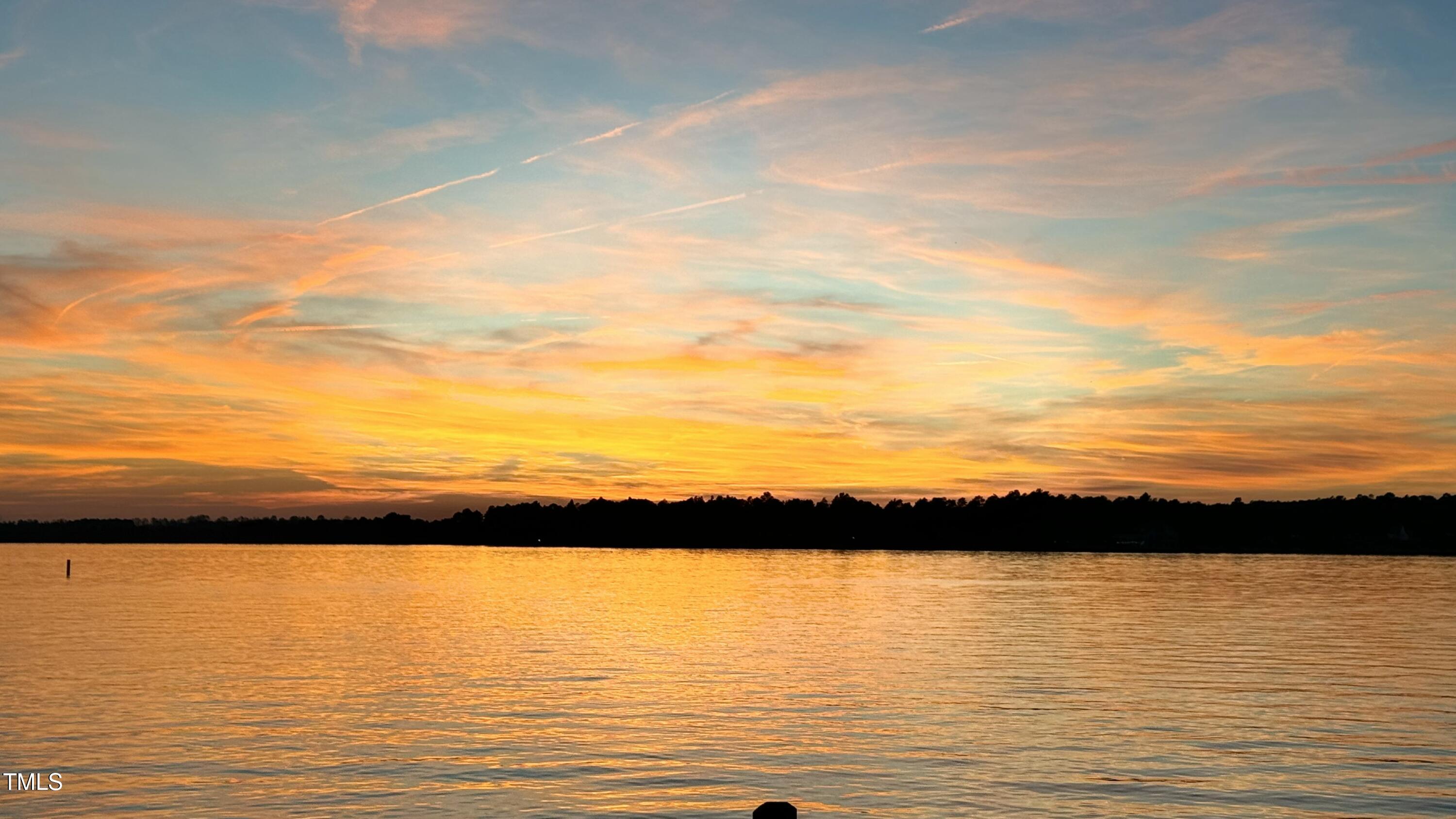 106 Mace Point West End, NC 27376 - Photo 75 of 79 a view of ocean and sunset