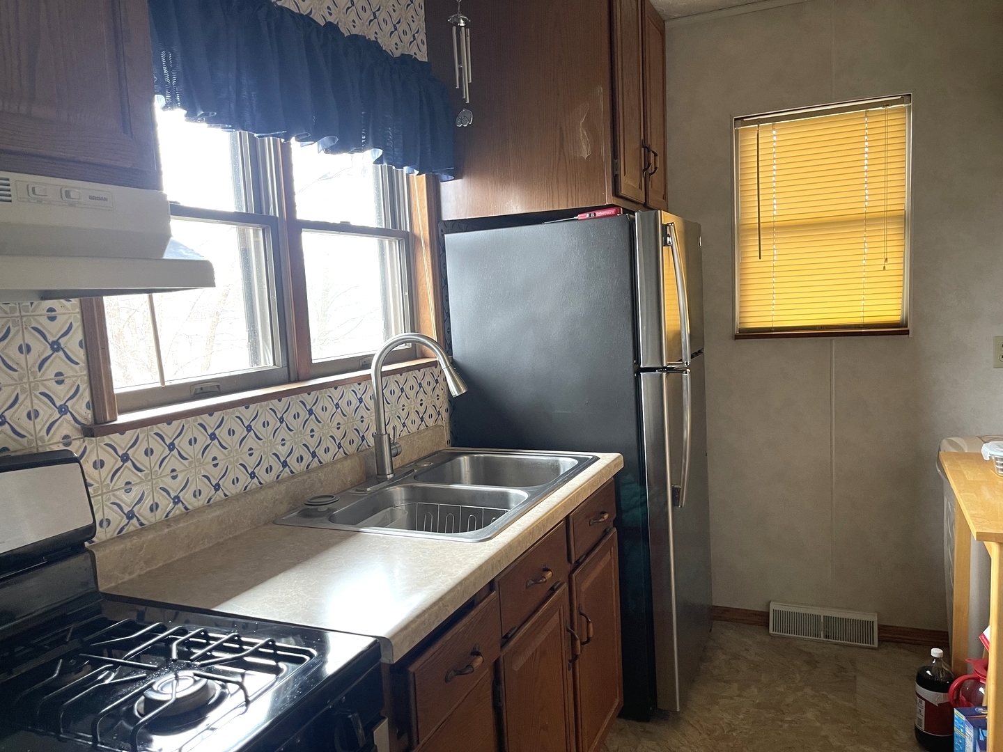 105 West 4th Street Spring Valley, IL 61362 - Photo 8 of 17 a kitchen that has a sink and a window in it